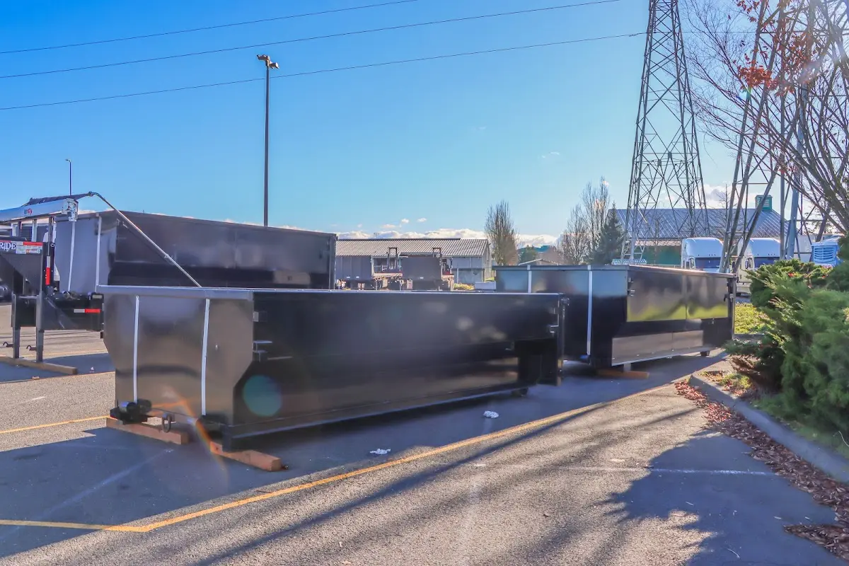 Roll-off dumpster ready for waste disposal at job site for 15 Yard Dumpster Rental in Hudson
